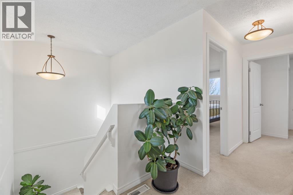 hallway on upper floor - 164 Beddington Circle Ne, Calgary, AB - Indoor Photo Showing Other Room
