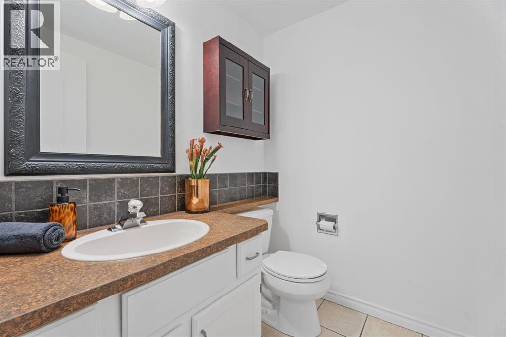 powder room on main - 164 Beddington Circle Ne, Calgary, AB - Indoor Photo Showing Bathroom