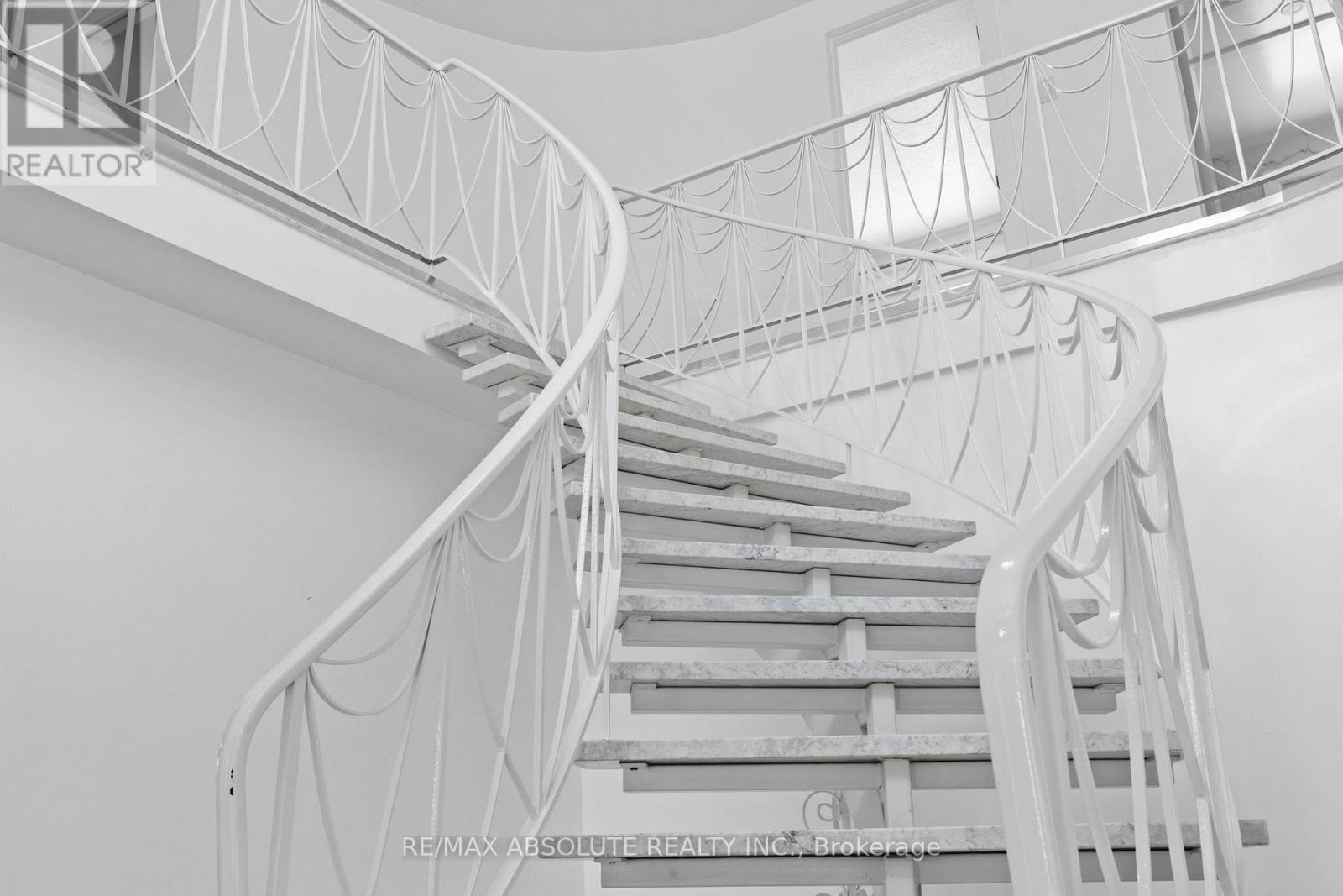 Open, flowy marble staircase - 1444 Normandy Crescent, Ottawa, ON - Indoor With Storage