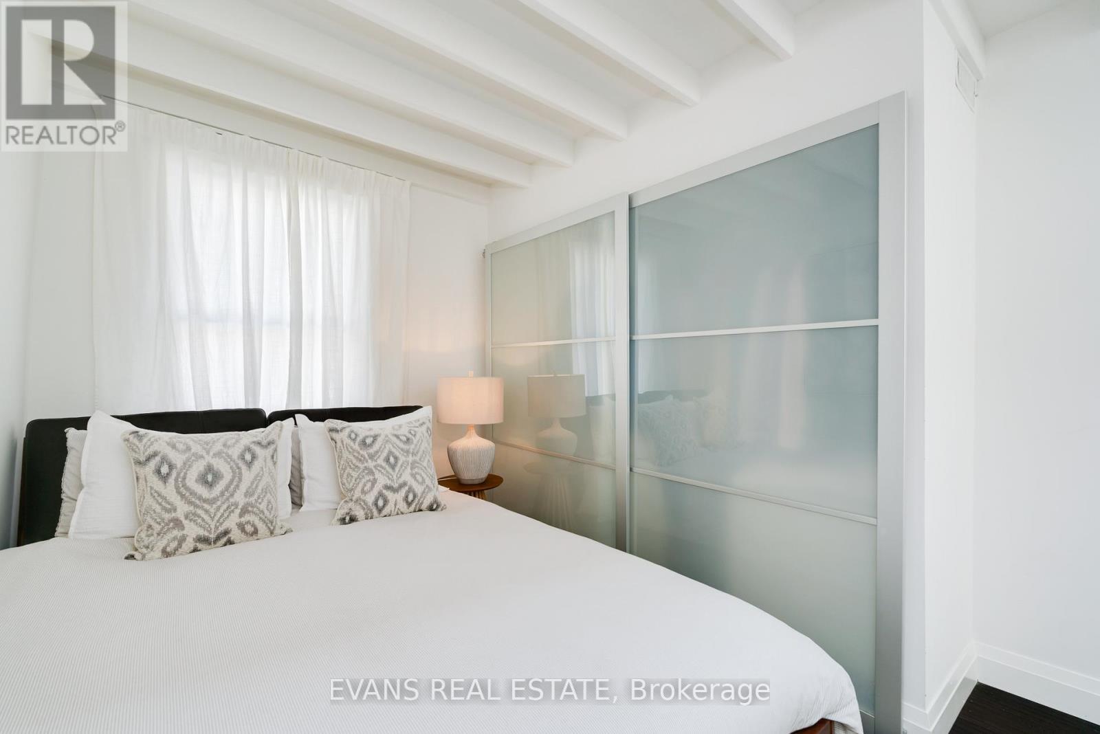 448 Gerrard St E Primary Double Closet - 448 Gerrard Street E, Toronto, ON - Indoor Photo Showing Bedroom