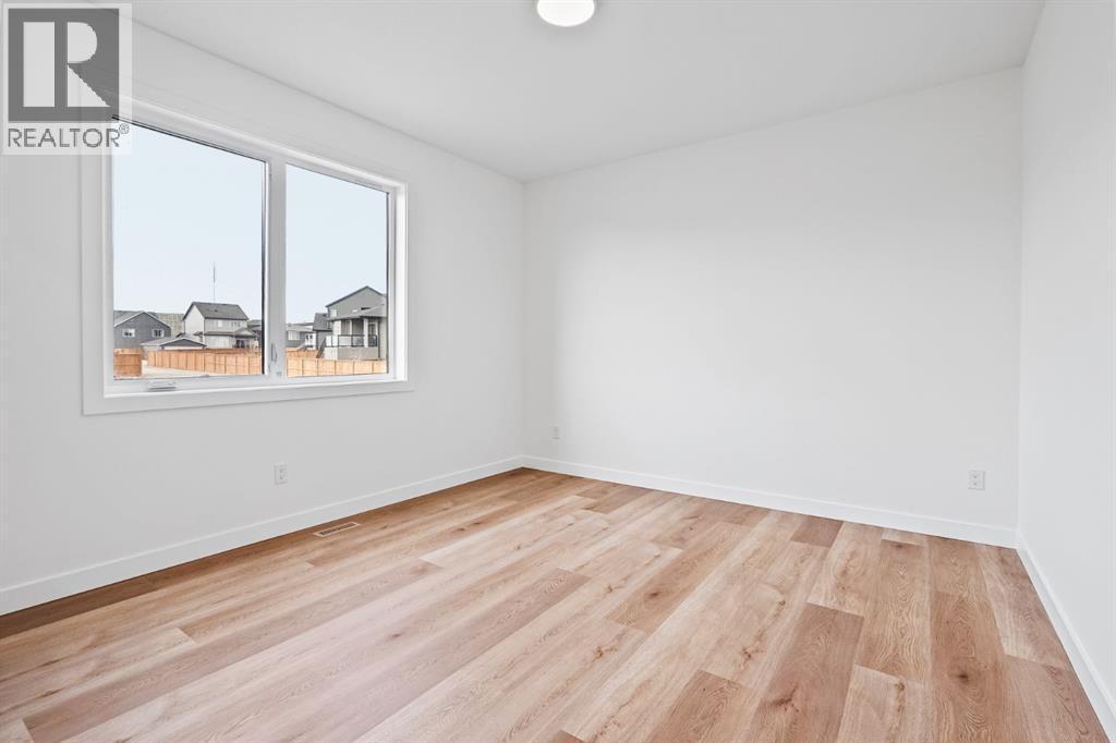 383 Caledonia Boulevard W, Lethbridge, AB - Indoor Photo Showing Other Room