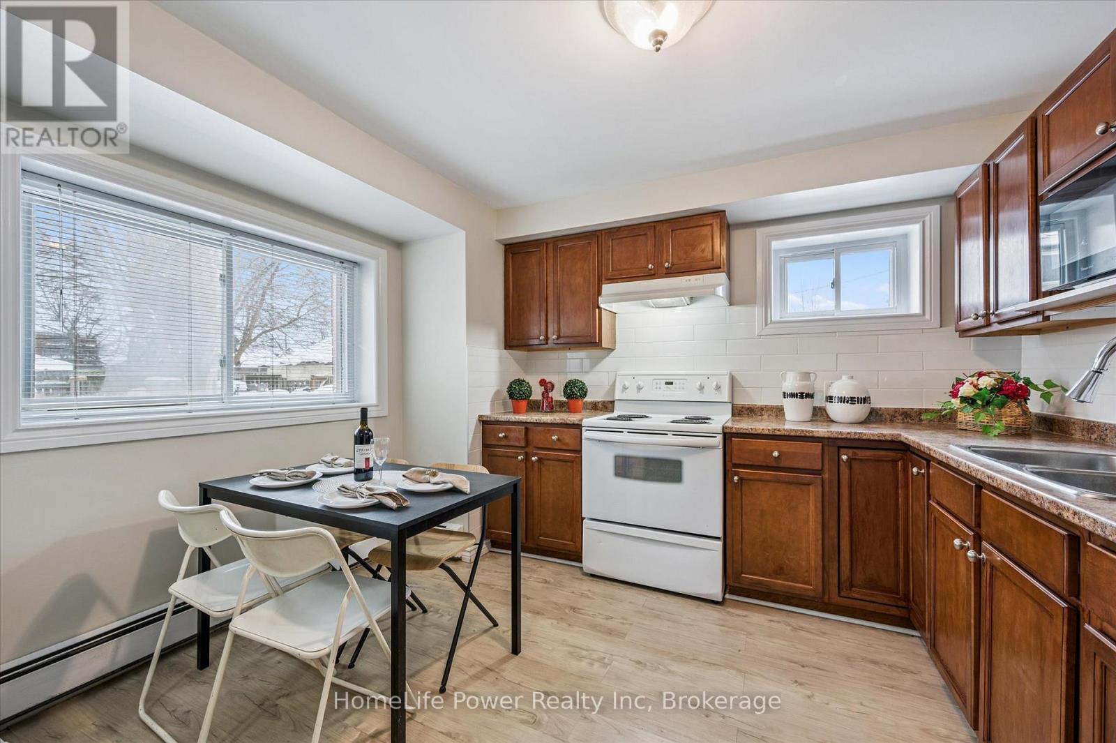Unit A - 319 Victoria Street S, Kitchener, ON - Indoor Photo Showing Kitchen With Double Sink