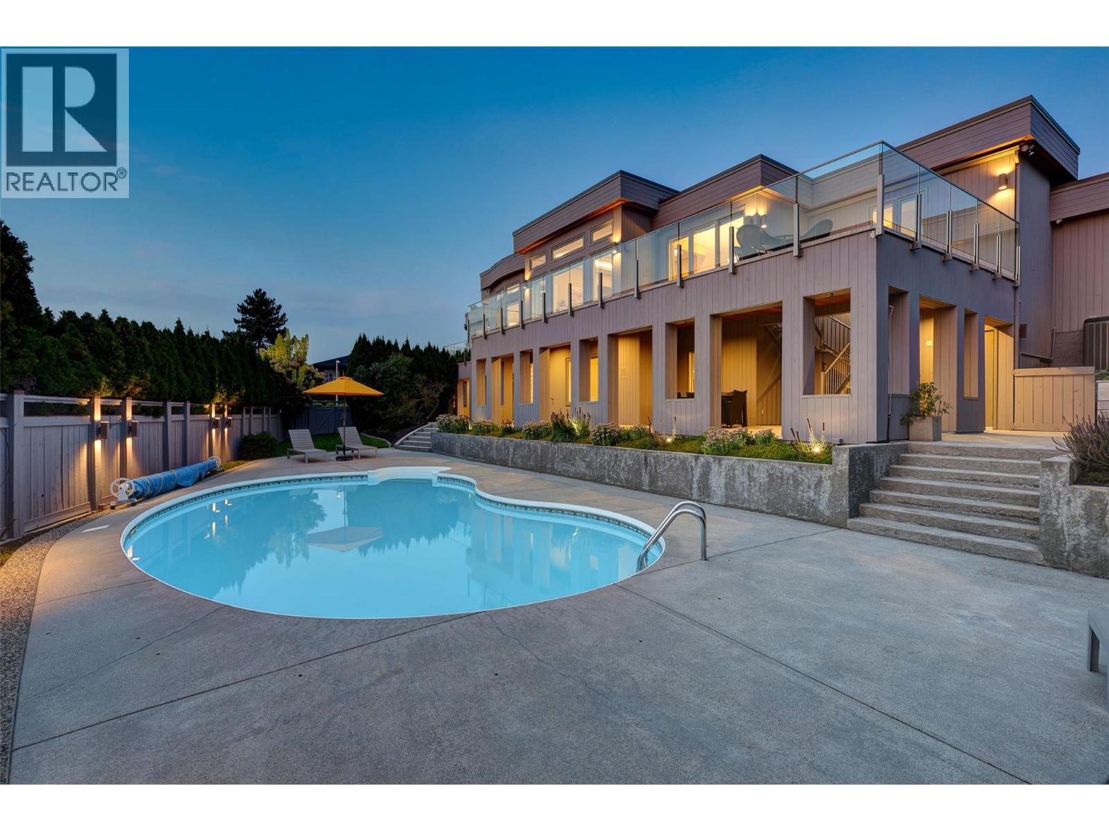 344 Raven Drive, Kelowna, BC - Outdoor With In Ground Pool With Deck Patio Veranda