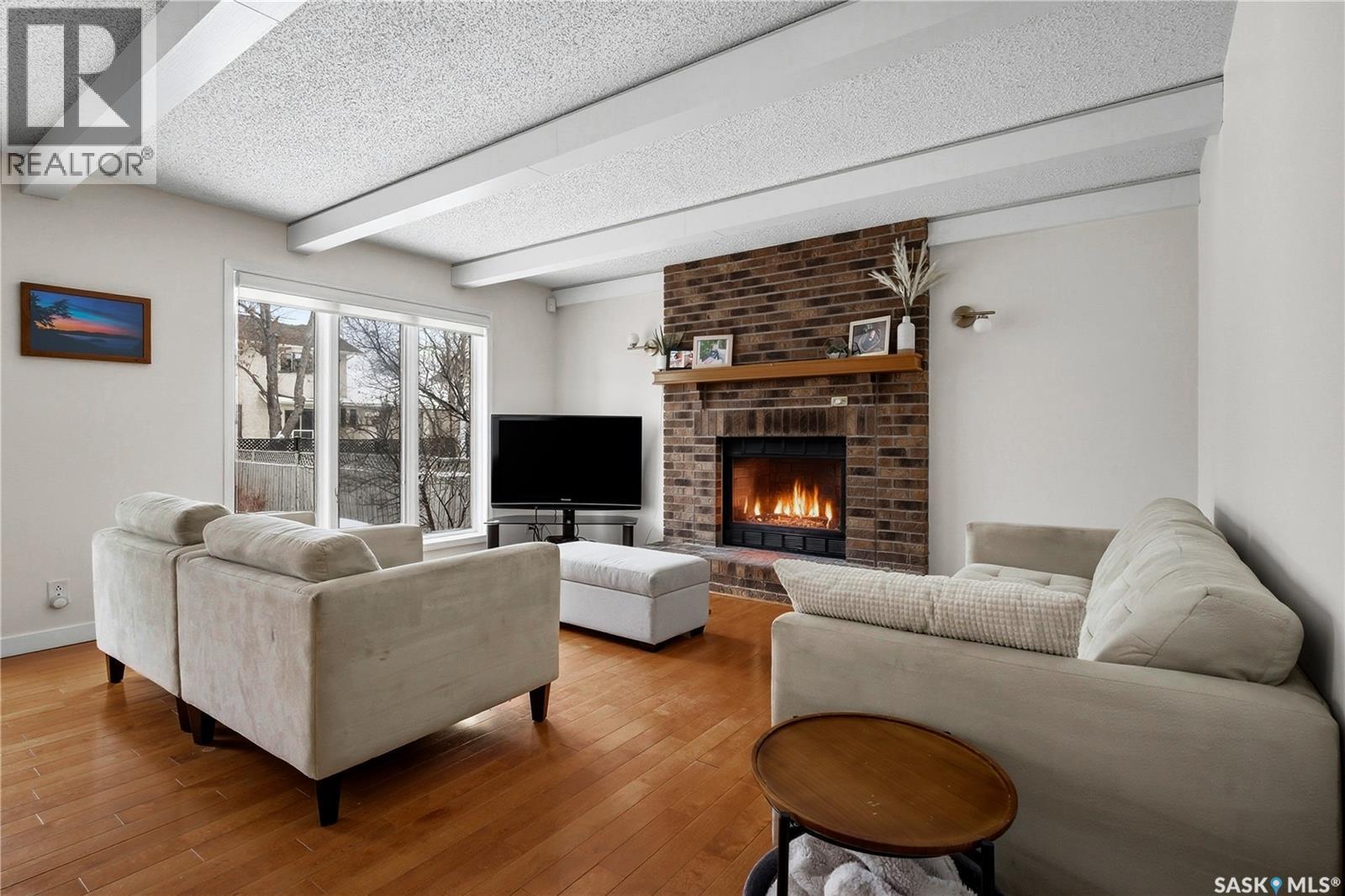 290 Rogers Road, Regina, SK - Indoor Photo Showing Living Room With Fireplace