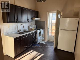 26 Harvey Street, Hamilton, ON - Indoor Photo Showing Kitchen With Double Sink