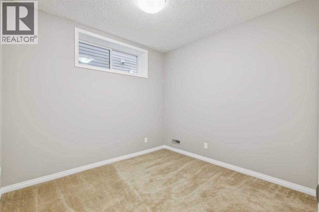 71 Walden Manor Se, Calgary, AB - Indoor Photo Showing Other Room