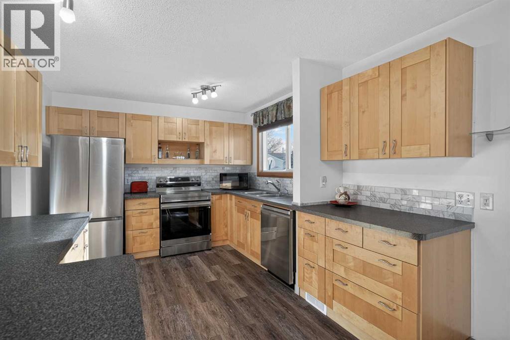 16 Rundleson Way Ne, Calgary, AB - Indoor Photo Showing Kitchen With Stainless Steel Kitchen