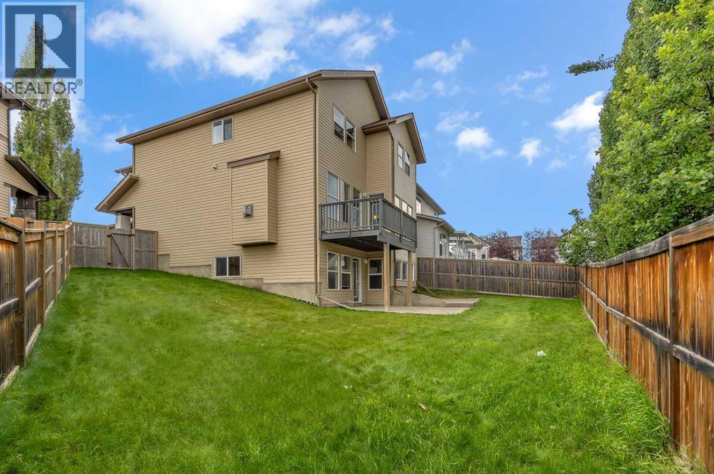 224 Panamount Point Nw, Calgary, AB - Outdoor With Backyard With Exterior