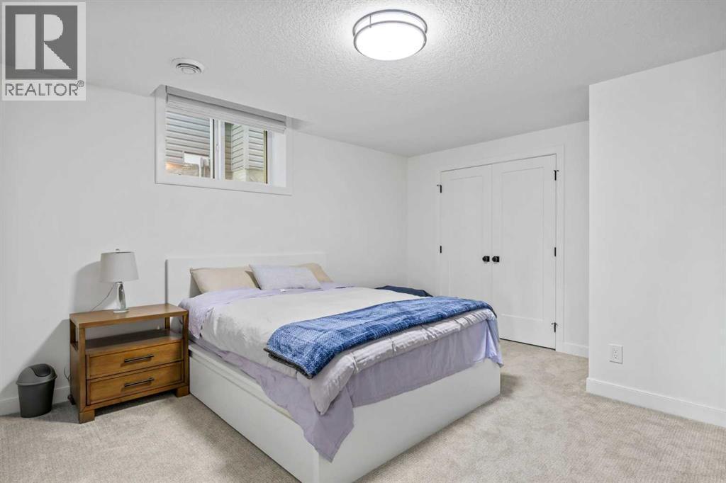 656 Bayview Way Sw, Airdrie, AB - Indoor Photo Showing Bedroom