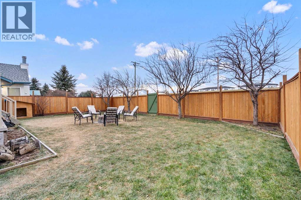 43 Sunset Crescent, Okotoks, AB - Outdoor With Backyard