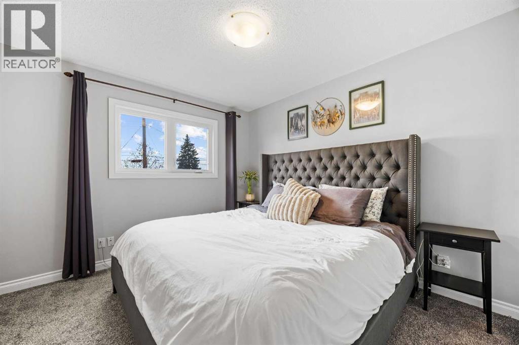 123 Sackville Drive Sw, Calgary, AB - Indoor Photo Showing Bedroom
