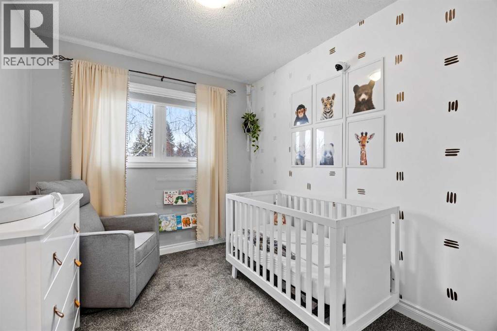 123 Sackville Drive Sw, Calgary, AB - Indoor Photo Showing Bedroom