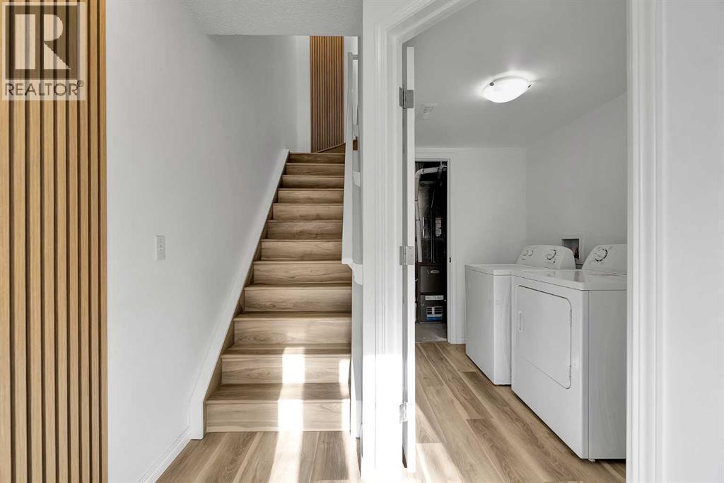 169 Windstone Park Sw, Airdrie, AB - Indoor Photo Showing Laundry Room