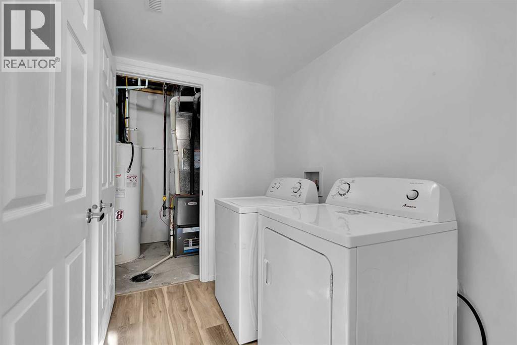 169 Windstone Park Sw, Airdrie, AB - Indoor Photo Showing Laundry Room
