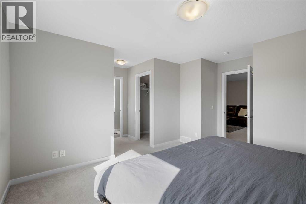 33 Walcrest Way Se, Calgary, AB - Indoor Photo Showing Bedroom