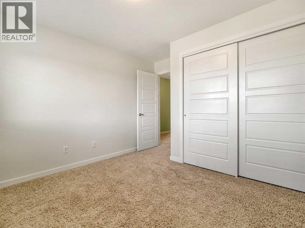 98 Moonlight Boulevard W, Lethbridge, AB - Indoor Photo Showing Other Room