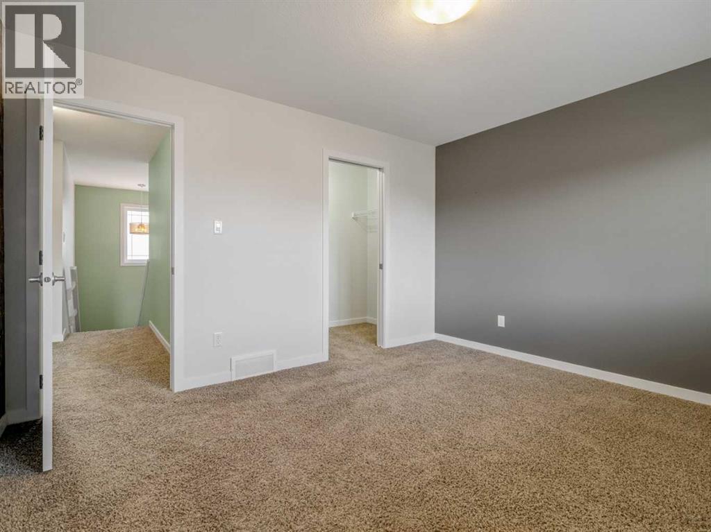 98 Moonlight Boulevard W, Lethbridge, AB - Indoor Photo Showing Other Room