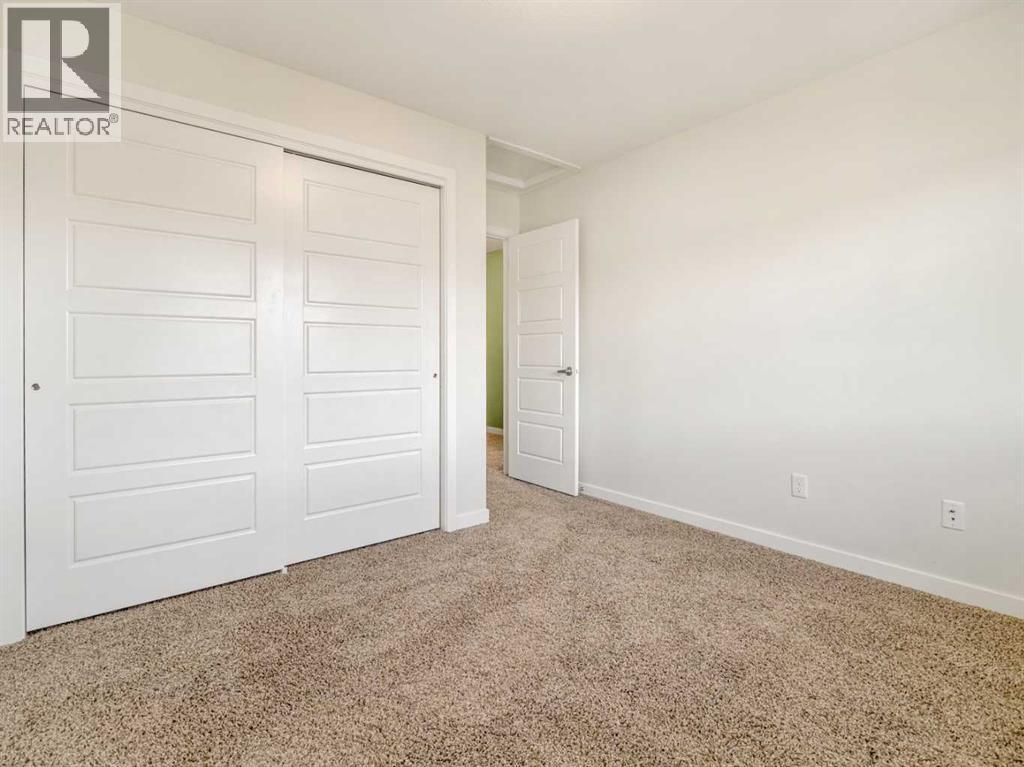 98 Moonlight Boulevard W, Lethbridge, AB - Indoor Photo Showing Other Room