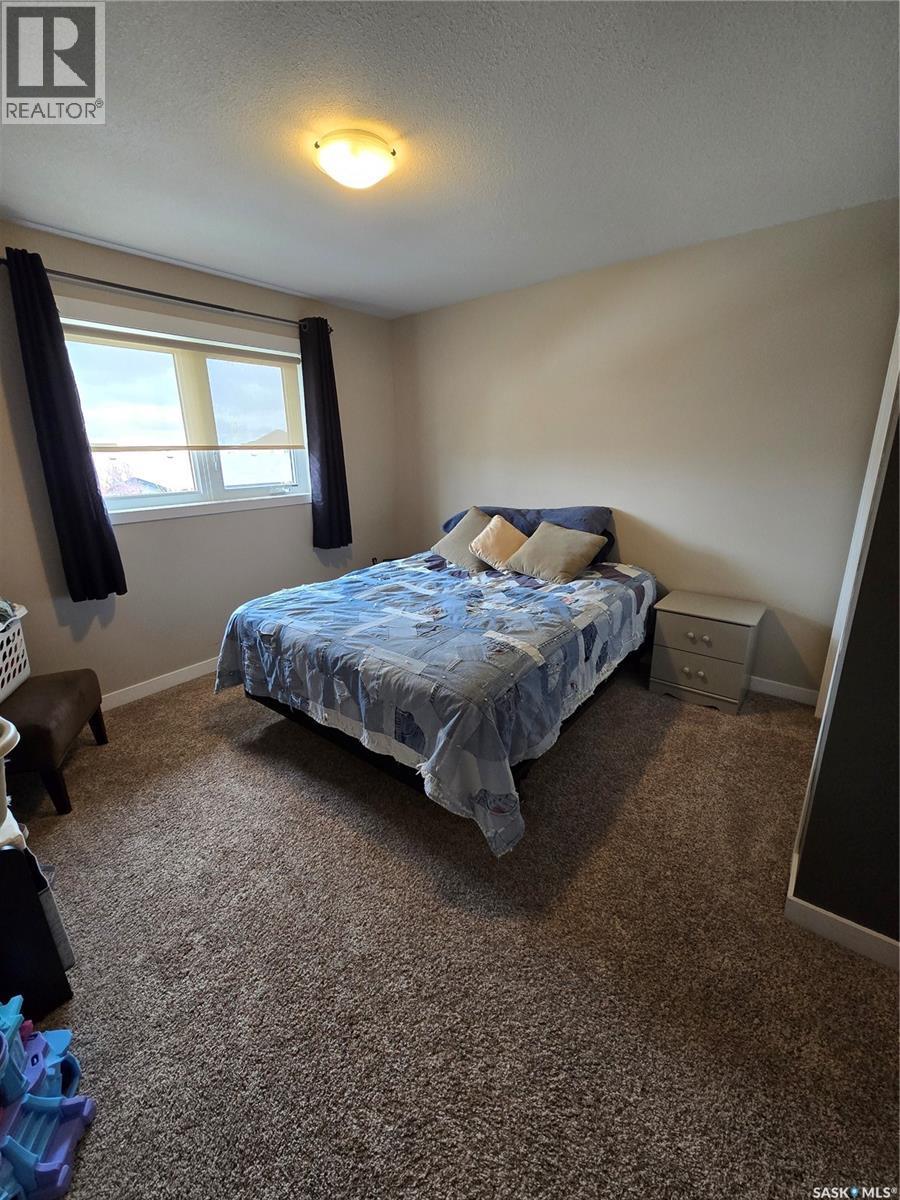 721 Barber Crescent, Weyburn, SK - Indoor Photo Showing Bedroom