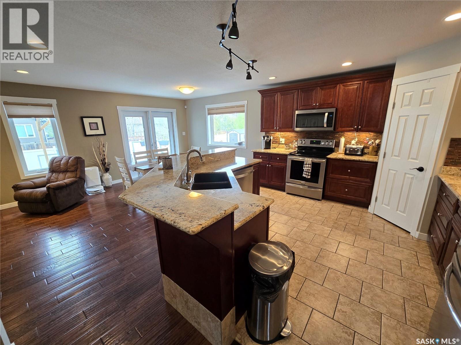 721 Barber Crescent, Weyburn, SK - Indoor Photo Showing Kitchen With Double Sink