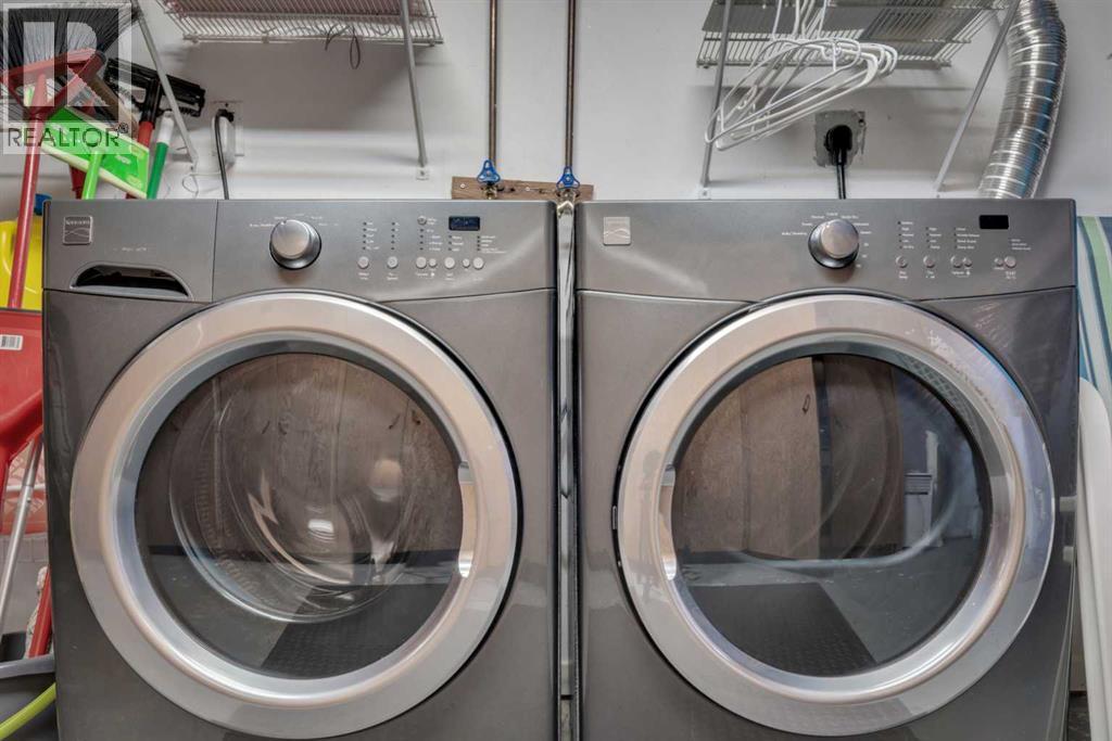 19 Garrick Drive Sw, Calgary, AB - Indoor Photo Showing Laundry Room