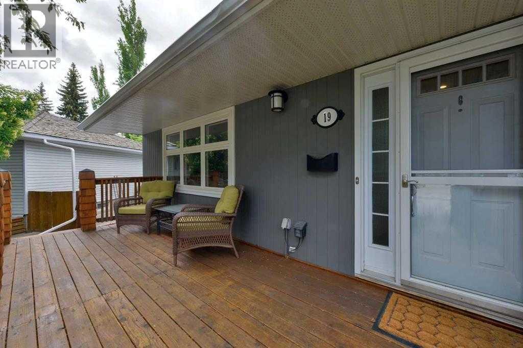 19 Garrick Drive Sw, Calgary, AB - Outdoor With Deck Patio Veranda With Exterior