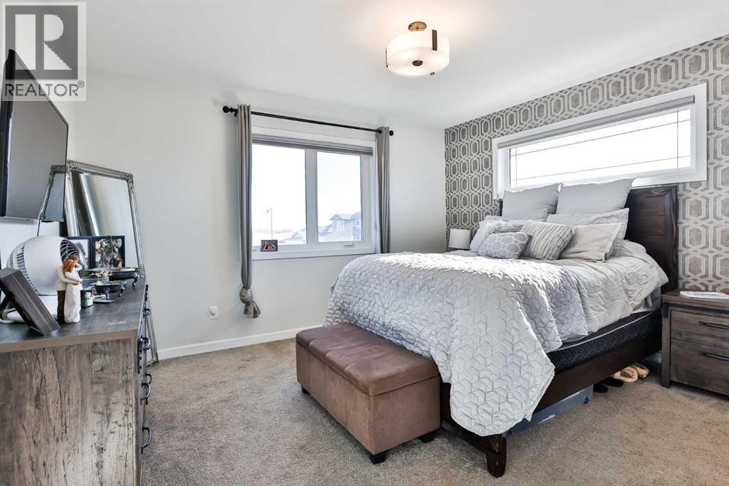 128 Cabot Landing W, Lethbridge, AB - Indoor Photo Showing Bedroom