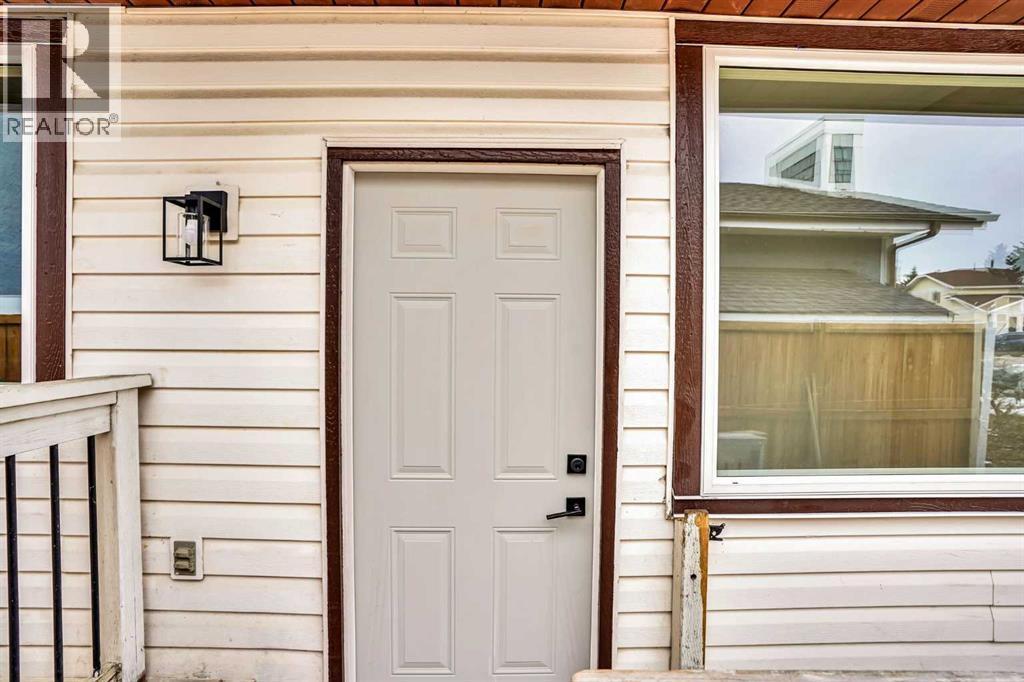 SEPARATE ENTRANCE - 23 Shawmeadows Place Sw, Calgary, AB - Outdoor With Exterior