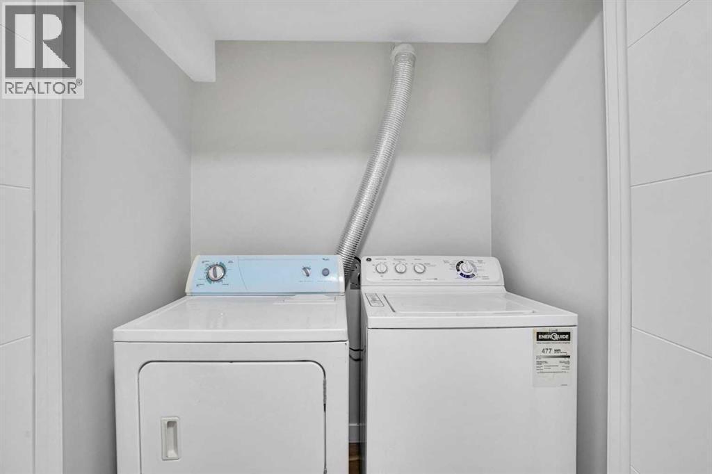 BASEMENT LAUNDRY - 23 Shawmeadows Place Sw, Calgary, AB - Indoor Photo Showing Laundry Room