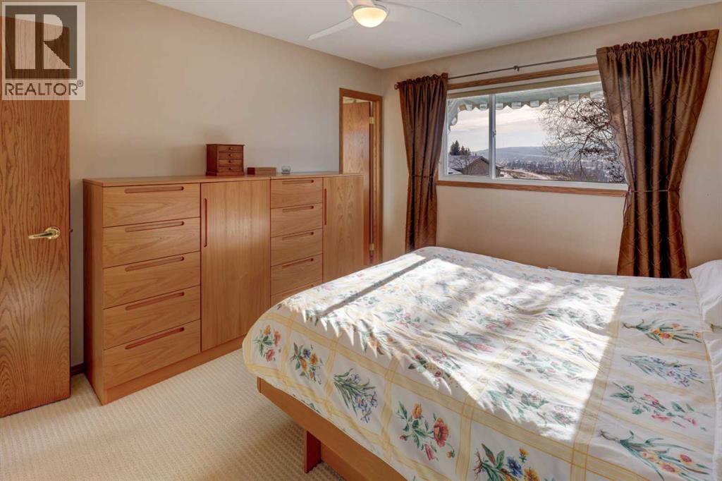 Primary Bedroom - 5943 Silver Ridge Drive Nw, Calgary, AB - Indoor Photo Showing Bedroom