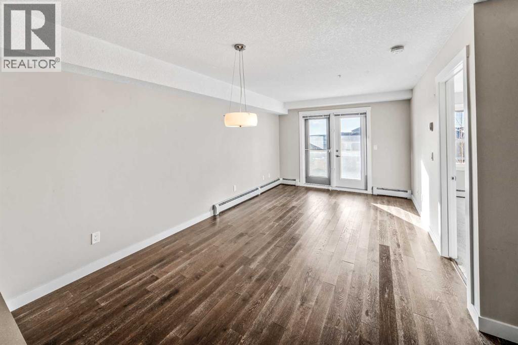 304, 2300 Evanston Square Nw, Calgary, AB - Indoor Photo Showing Other Room