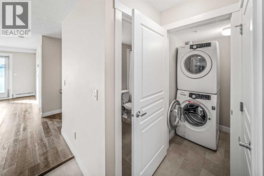 304, 2300 Evanston Square Nw, Calgary, AB - Indoor Photo Showing Laundry Room