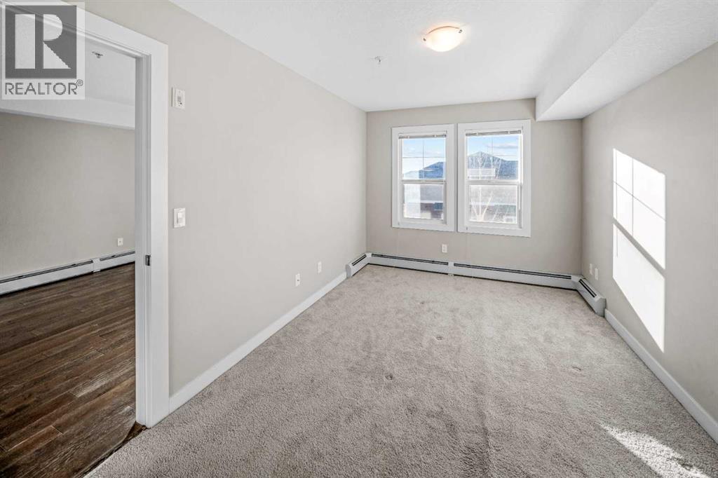 304, 2300 Evanston Square Nw, Calgary, AB - Indoor Photo Showing Other Room