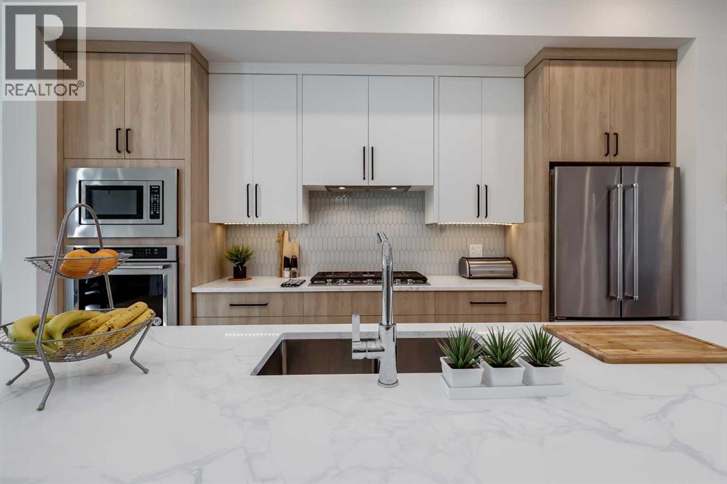 2520 Cochrane Road Nw, Calgary, AB - Indoor Photo Showing Kitchen With Stainless Steel Kitchen With Upgraded Kitchen