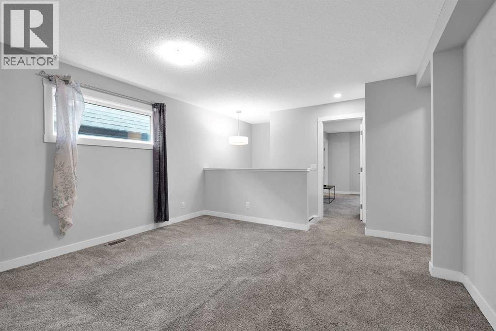 349 Calhoun Common Ne, Calgary, AB - Indoor Photo Showing Other Room