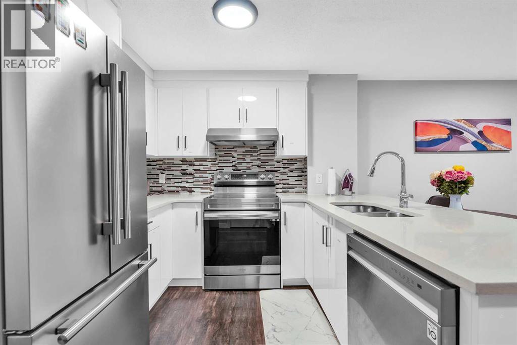 349 Calhoun Common Ne, Calgary, AB - Indoor Photo Showing Kitchen With Double Sink With Upgraded Kitchen