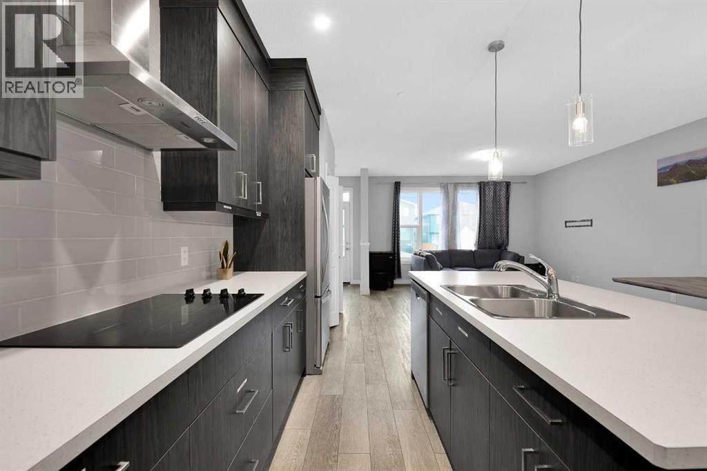 349 Calhoun Common Ne, Calgary, AB - Indoor Photo Showing Kitchen With Double Sink With Upgraded Kitchen