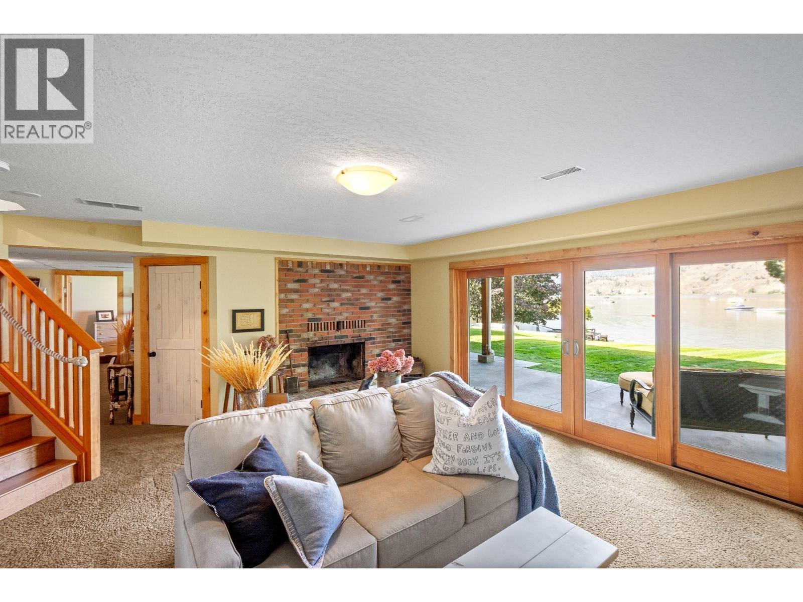 138 Devon Drive, Okanagan Falls, BC - Indoor Photo Showing Living Room With Fireplace