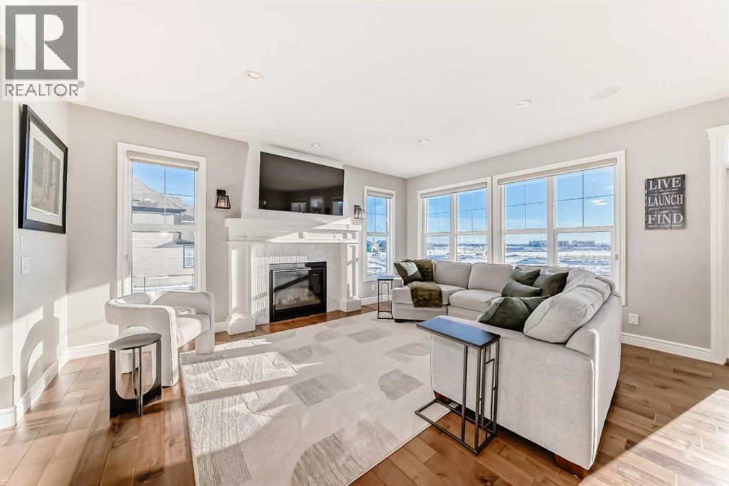 35 Mahogany Crescent Se, Calgary, AB - Indoor Photo Showing Living Room With Fireplace
