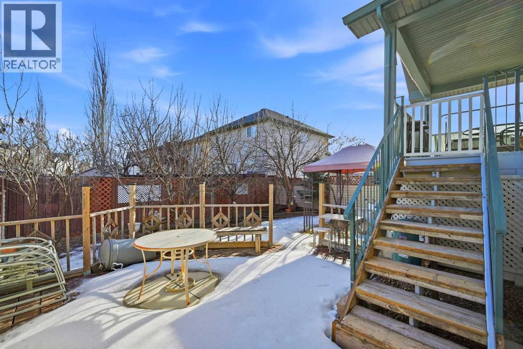 311 Saddlecreek Point Ne, Calgary, AB - Outdoor With Deck Patio Veranda