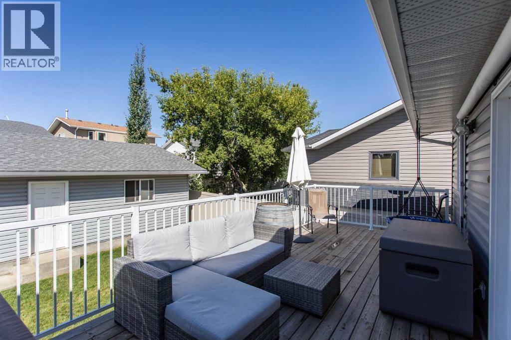 34 Bruns Bay, Lacombe, AB - Outdoor With Deck Patio Veranda With Exterior
