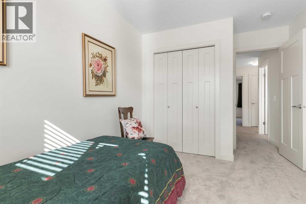 167 Fireside Drive, Cochrane, AB - Indoor Photo Showing Bedroom
