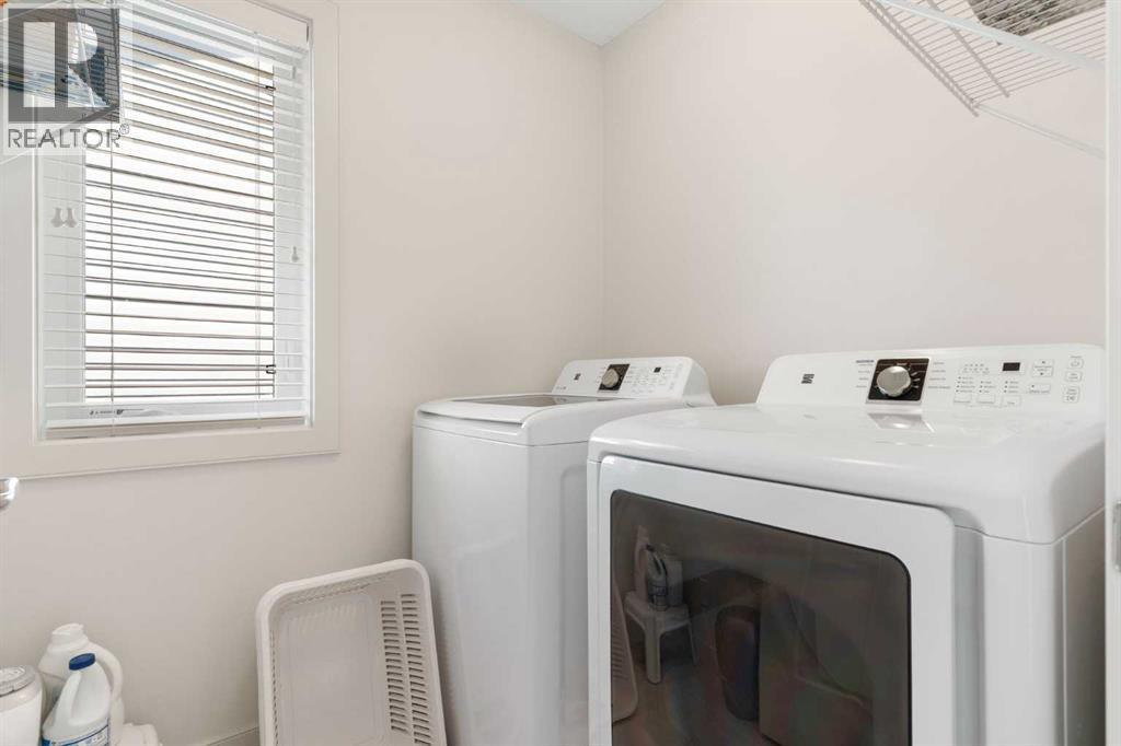 167 Fireside Drive, Cochrane, AB - Indoor Photo Showing Laundry Room