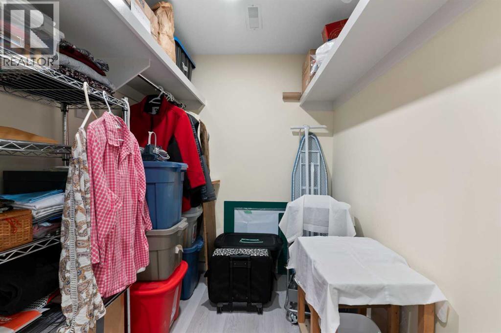 167 Fireside Drive, Cochrane, AB - Indoor With Storage