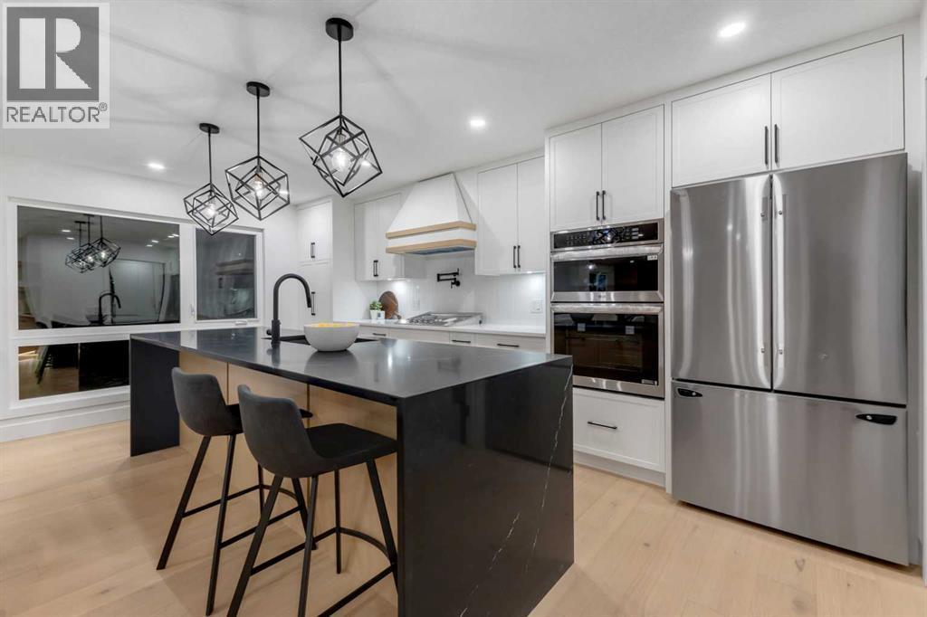 9419 Academy Drive Se, Calgary, AB - Indoor Photo Showing Kitchen With Upgraded Kitchen