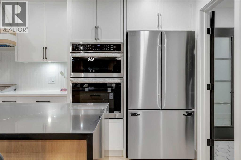 9419 Academy Drive Se, Calgary, AB - Indoor Photo Showing Kitchen With Upgraded Kitchen