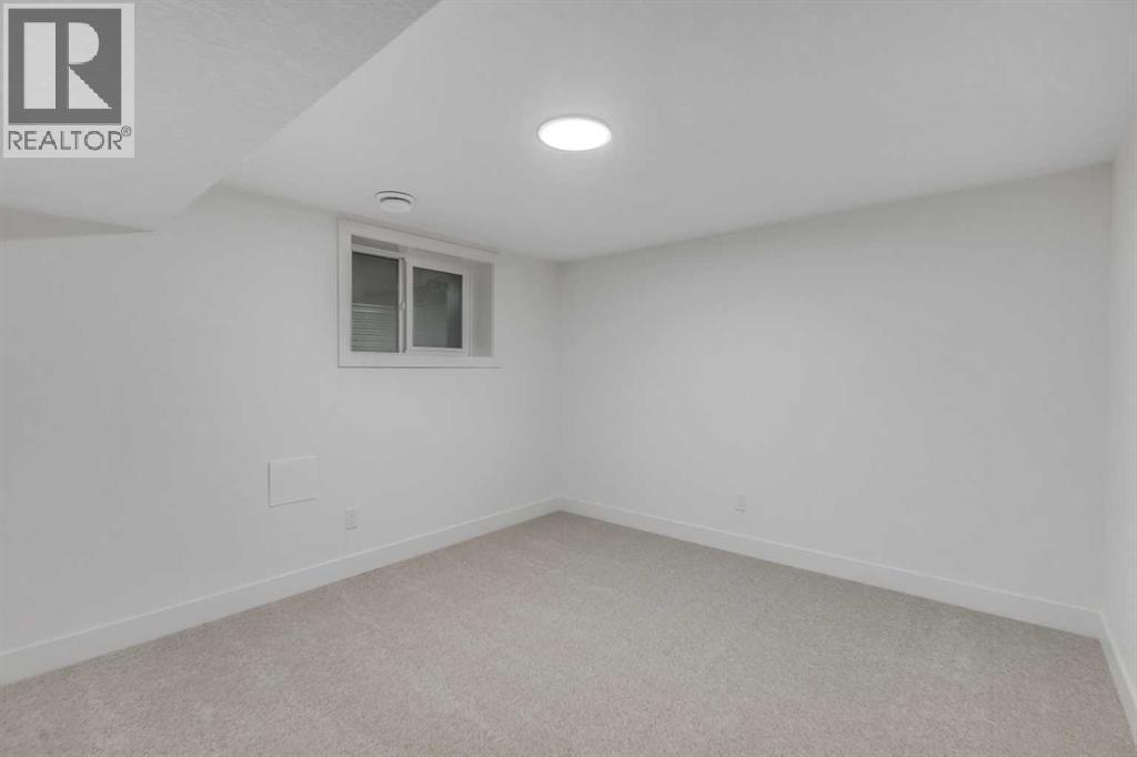 9419 Academy Drive Se, Calgary, AB - Indoor Photo Showing Other Room
