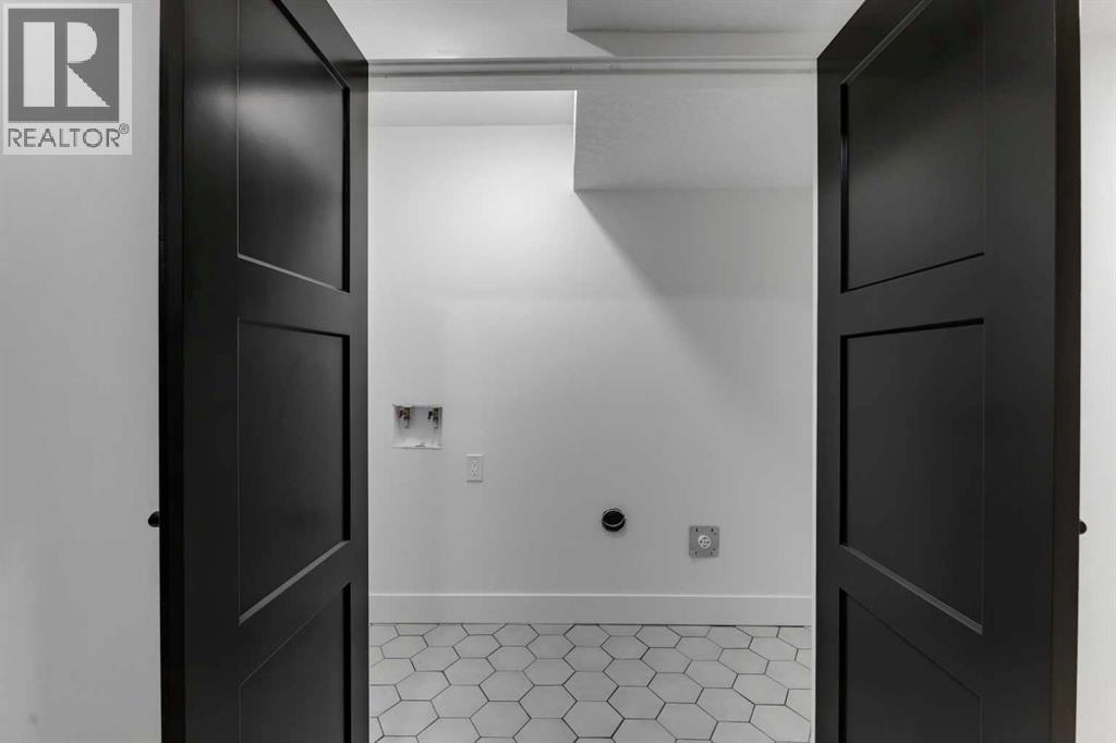 Basement Laundry RI - 9419 Academy Drive Se, Calgary, AB - Indoor