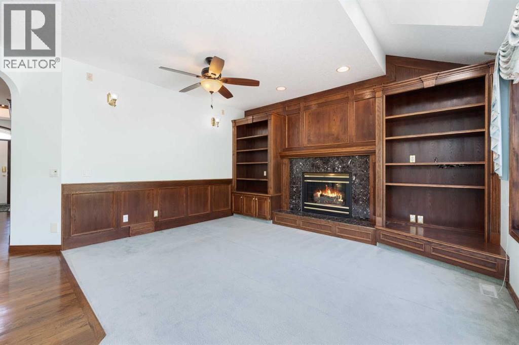 1600 Evergreen Hill Sw, Calgary, AB - Indoor With Fireplace