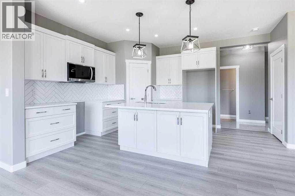 55 Everson Close, Red Deer, AB - Indoor Photo Showing Kitchen With Upgraded Kitchen